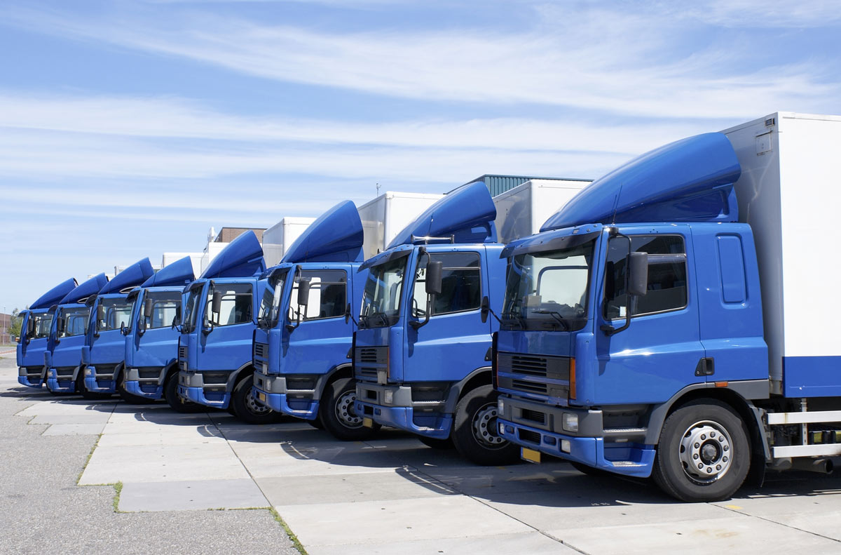 line-of-blue-trucks A line of blue trucks