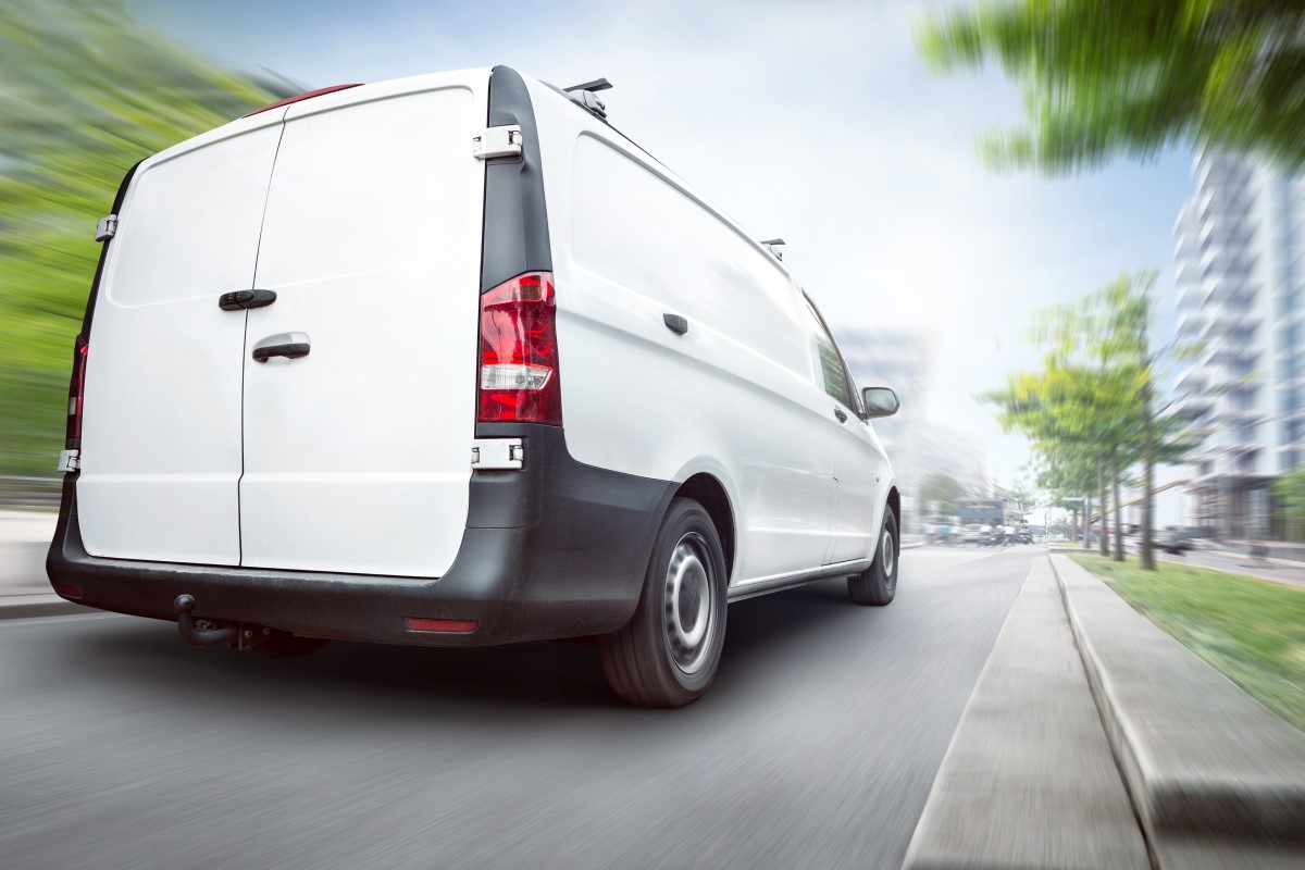white-delivery-van-on-road Courier & Parcel